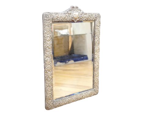 A large Edwardian repousse silver mounted easel mirror, Birmingham, 1905, 48.7cm. Condition - poor