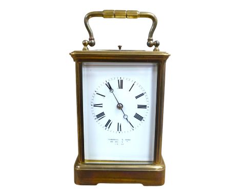 A Marshall &amp; Sons repeating brass cased carriage clock, no key, 17cm high. Condition - fair, untested