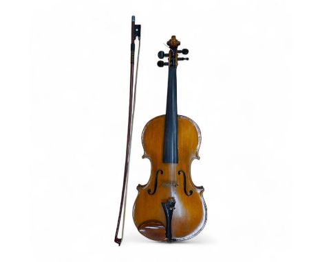 A cased early 20th century European violin, with label reading ‘Antonius Stradivarius Cremonenfis’, body length 36cm, with P&