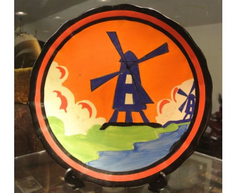 CLARICE CLIFF - A stunningly rare Clarice Cliff 'Applique Windmill' pattern plaque, produced from 1930-1931. This piece has a