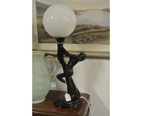 FURNITURE/ HOME - A vintage Art Deco style ceramic table lamp with white glass globe.	