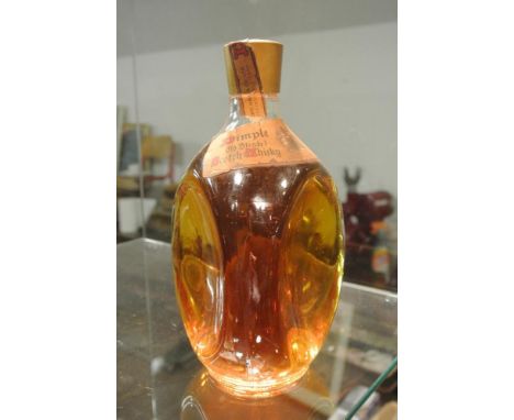 DIMPLE - A vintage bottle of Dimple Scotch Whisky.	