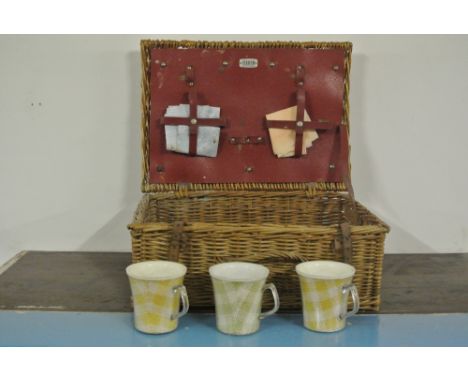 COLLECTABLES - A vintage wicker picnic basket.	