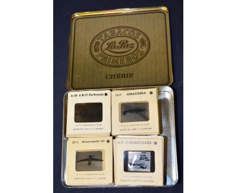 Metal tin containing number of WWII US Army Airforce aircraft recognition slides, some in colour, including Lancaster, B17, M