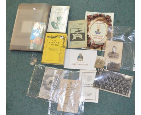 Collection of assorted military books, pamphlets and photographs from WWI, WWII, including Ministry of Information leaflet, S