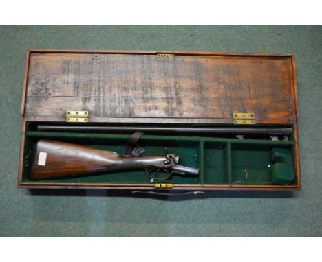 Boxed vintage side by side hammer fire double trigger twelve gauge under lever shotgun, by Army &amp; Navy CSI London SN 1028