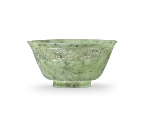A Qajar engraved jade cup Persia, 19th Centuryof flaring form with slightly everted rim on a short foot, engraved with four c