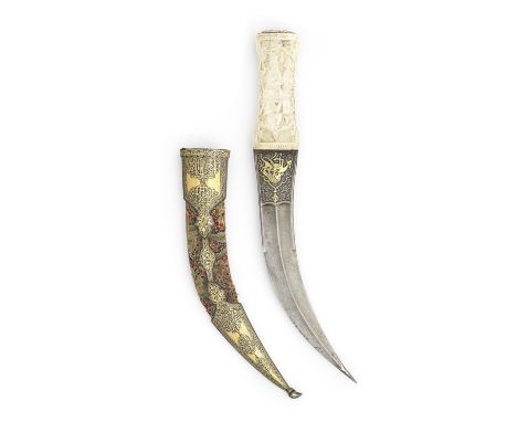 A Qajar bone-hilted steel dagger (jambiyya) Persia, 19th Centurythe double-edged watered-steel blade of curved form, chiselle