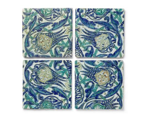 Four Diyarbakir pottery tiles Turkey, late 16th Centuryeach of square form, decorated underglaze in raised-red, cobalt blue, 