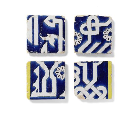 Four Timurid cuerda seca pottery Tiles Persia,  15th Centuryeach of square form, variously decorated in yellow, white and bla