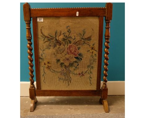 Tapestry fronted fire screen with twisty oak columns 