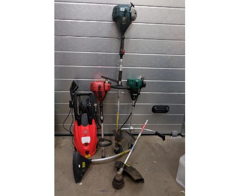 A collection of petrol grass trimmer's and edger's to include a Draper Expert with correct rotor, a sovereign engine with mou