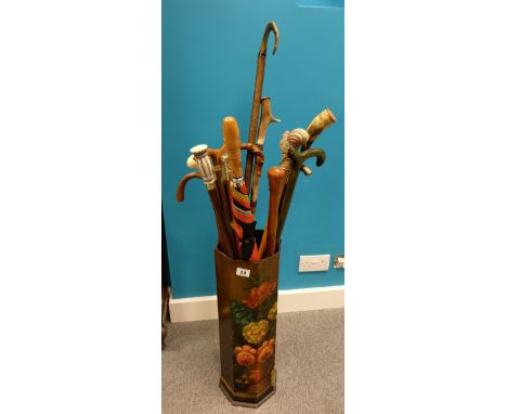 A good collection of Walking sticks and staff in ornate painting stick stand (15)