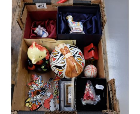 A collection of various pottery to include Royal Worcester chinese figure of a sheep in box, Punch and Judy candlestick extin