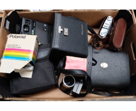 A collection of vintage cameras and binoculars 