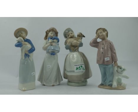 A collection of figures to include 2 Nao figures and two other Lladro style items (4)