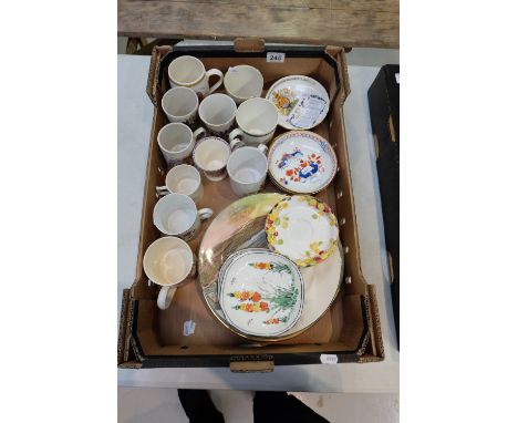 An interesting mixed collection of pottery to include commemorative items, Royal Doulton plates, early saucers etc