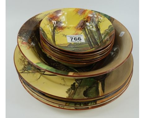 A collection of pottery to include Woodlands D4585 plates, Matching set of 6 saucers, fruit bowl and Haystack plate (11)