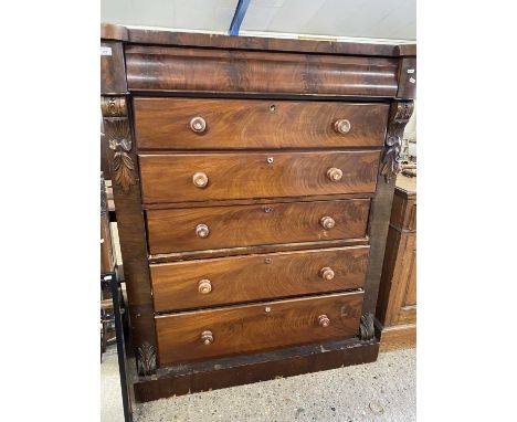 Large Scotch chest with six drawers and carved decoration