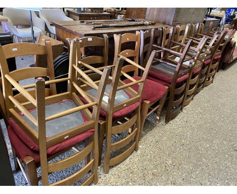 Thirteen ladder back dining chairs with red upholstered seats