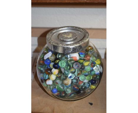 Jar of assorted glass marbles
