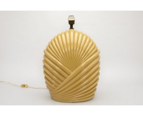 A LARGE BEIGE FLUTED LAMP
Of stylised shell form
62cm high x 38cm wide
Condition: Minor signs of wear commensurate with age a