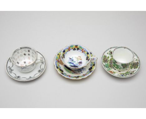 THREE ANTIQUE TEA CUPS AND SAUCERS
19th/early 20th Century
A Copeland &amp; Garrett example, decorated with green floral and 