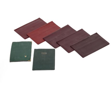VINTAGE ROLEX AND PATEK PHILIPPE LEATHER WALLETS AND HOLDERS
Comprising:
Five brown Patek Philippe leather bifold wallets wit