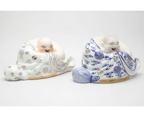 TWO LARGE PORCELAIN FIGURES OF BUDAI
Similarly modelled, with various decoration to the cloak
26cm high x 43cm wide
Condition