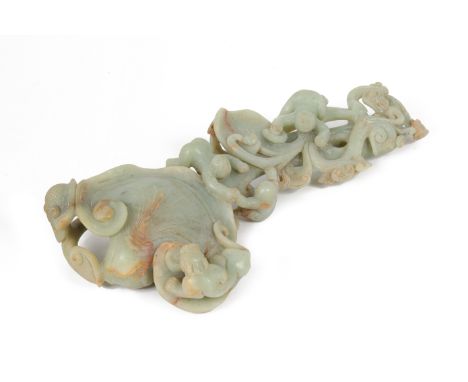 A LARGE ORIENTAL HARDSTONE/JADE CARVING
Of boys climbing a lotus
Measures 54cm high
Condition: Minor signs of wear commensura