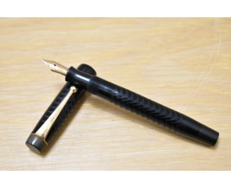 A Parker Ladies button fill fountain pen in chaised BHR having Parker 3 nib made in Canada