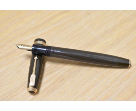 A Parker Duofold button fill fountain pen in chocolate brown with decorative band to the cap having Parker Duofold 14k Pen N 