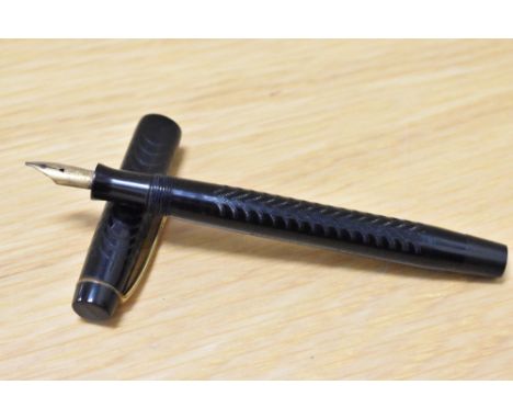 A Parker Ladys button fill fountain pen in black chaised design having warrented 14ct 1st quality nib