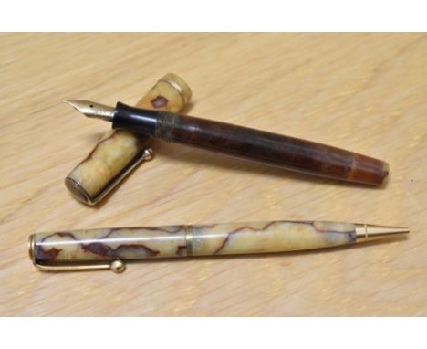A Parker Moderne Duette button fill fountain pen and propelling pencil in cream with red lines with a single band to the cap 