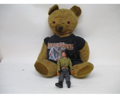 Action Man GI Joe stamped Palitoy Hasbro 1964, along with a plush teddy bear wearing a Freddie Mercury T-shirt, 70 cm tall 