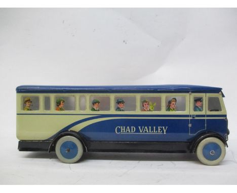 A 1940s/50s Chad Valley clockwork, tinplate blue bus, inscribed No 10005, 4 1/4"h x 12 "w 