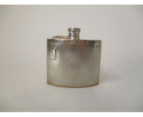 An Edward VIII silver hip flask by Walker &amp; Hall, Sheffield 1939, of curved form with engine turned decoration, initialle