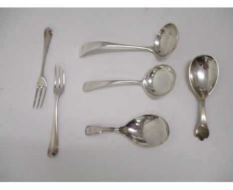 Silver flatware to include two early 20th century sauce ladles, two tea caddy spoons and a pair of pickle forks, 106g total 