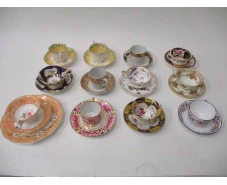 Twelve 18th century and later cups and saucers to include Worcester and other factories, a pair with fruiting vines in relief