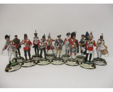 Thirty seven Chas C Stadden painted, cast metal model soldiers, the majority boxed and a model of Sir Francis Drake, each on 