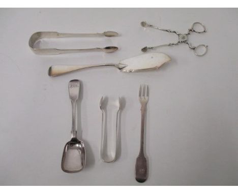 Silver flatware to include sugar tongs, a Victorian butter knife, a Victorian preserve spoon, two sugar tongs and a William I