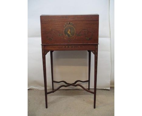 An Edwardian Sheraton revival painted mahogany chest, with a hinged, arched top enclosing a mahogany tray and paper-lined int