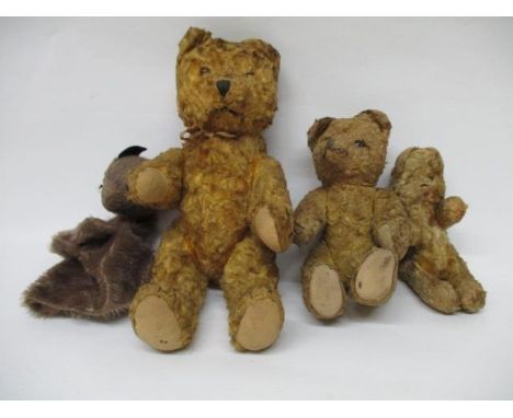 Three teddy bears with gold push, jointed bodies, 30cm h, 22cm and 17cm respectively, along with a brown plush hand puppet, 2