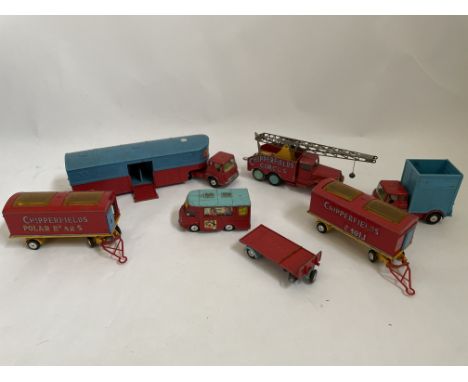 A collection of Corgi Toys Chipperfields Circus vehicles to include two animal cages, a platform trailer, Smith’s “Karrier” v