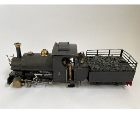 A Roundhouse steam engine train, black painted