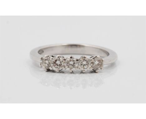 A five stone diamond half eternity ring, set with five round brilliant cut diamonds, total diamond weight approx. 0.50ct, sta