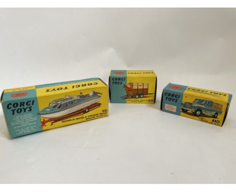 Corgi Toys die cast scale model number 104, Dolphin 20 cruiser on Wincheon trailer together with Corgi Toys Land Rover, numbe