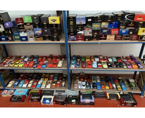 105 assorted 1/18 scale diecast model cars together with 92 associated boxes. NO RESERVE."PLEASE NOTE - All lots from this ve