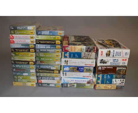 A good quantity of military model kits by Italeri and others, including twenty nine boxed and shrink wrapped Zvezda Military 