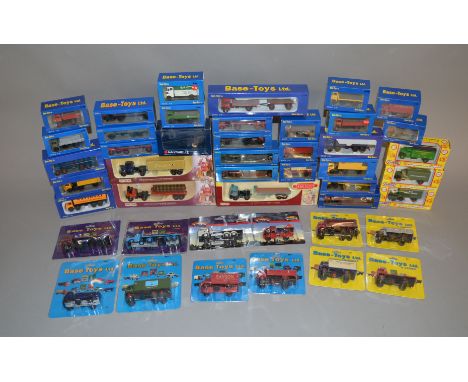 A good quantity of boxed and carded miniature diecast car, van and truck models, mostly in 1:76 scale, from the Lledo 'Tracks